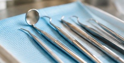 Sterile dental instruments prepared for a patient visit